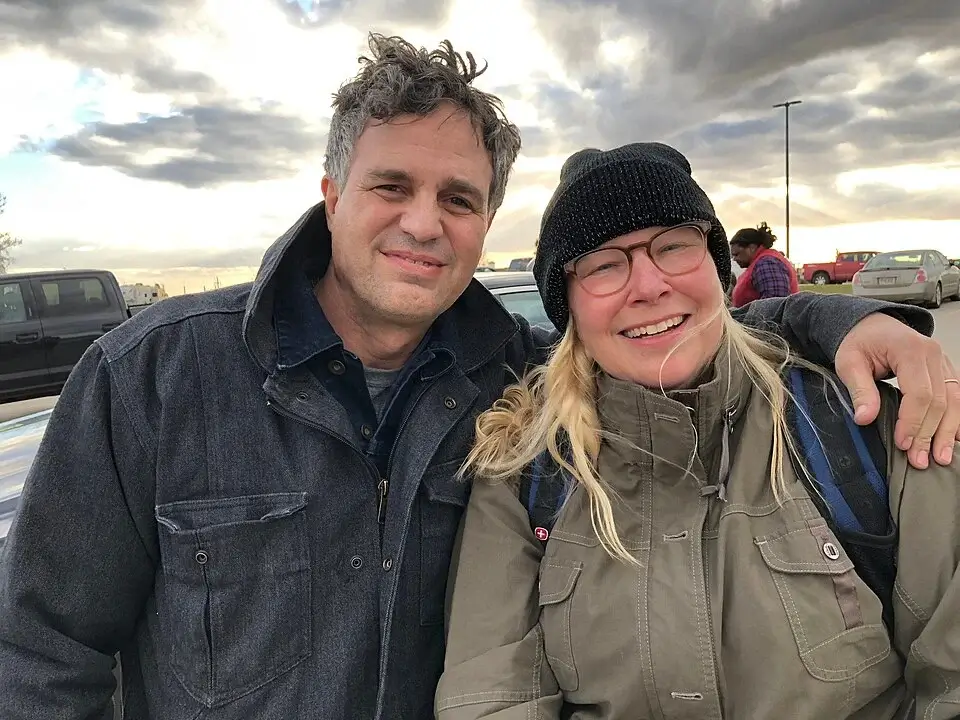 Mark Ruffalo smiling outdoors in a casual photo with a companion