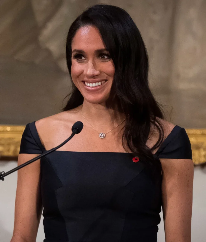 Meghan Markle Duchess of Sussex speaking at official podium event during royal tour