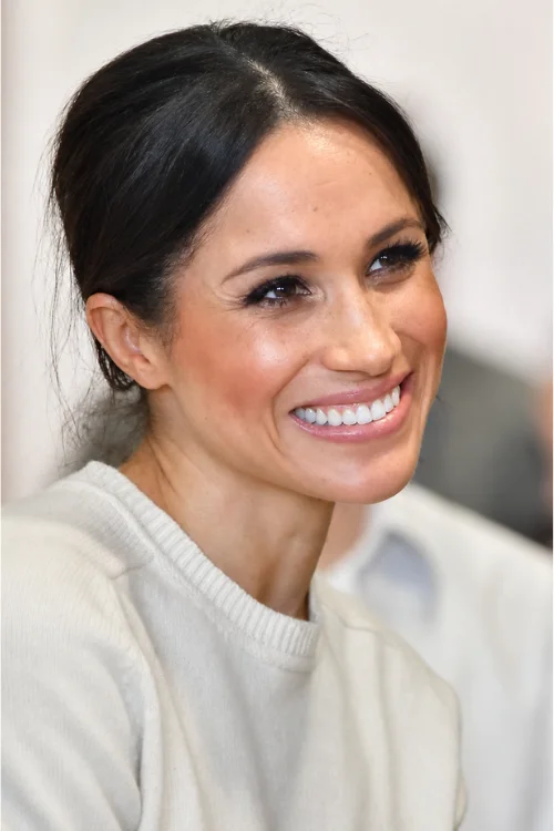 Meghan Markle smiling at public appearance