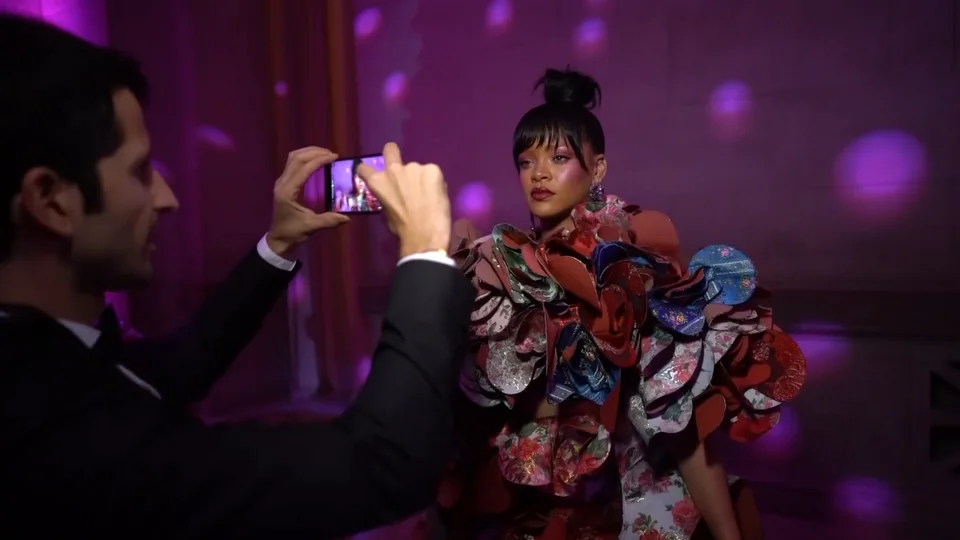 Rihanna in floral gown at the 2017 Met Gala reflecting her rising Rihanna net worth 2025