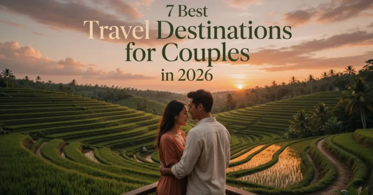 Couple embracing on wooden deck overlooking Ubud rice terraces at sunset in Bali