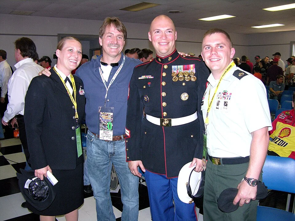 "Jeff Foxworthy with U.S. military service members at USO event - comedian supporting troops"