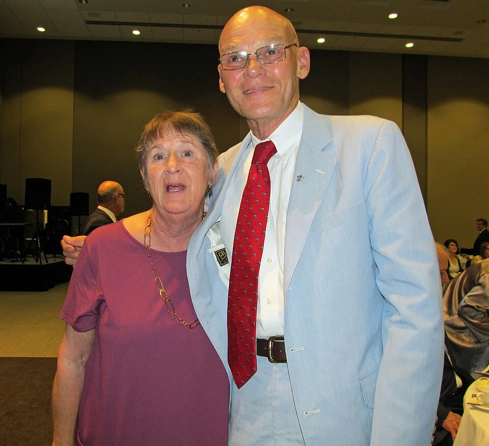 "James Carville at public event - Political consultant posing with supporter at Louisiana community gathering"