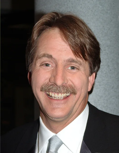 "Jeff Foxworthy smiling portrait wearing black suit - American stand-up comedian born 1958"