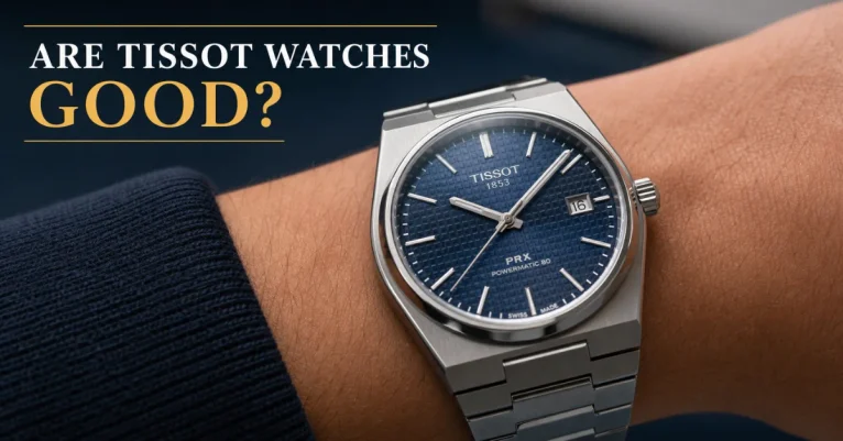 Are Tissot watches good: a Tissot PRX Powermatic 80 with deep blue dial on a wrist, dial detail and bracelet clearly visible