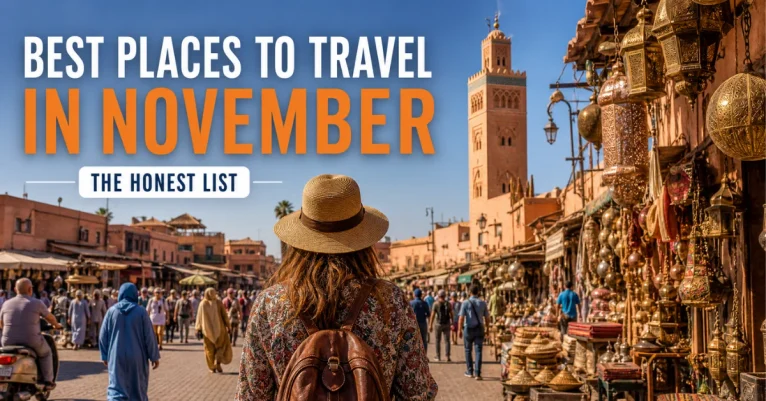 Best places to travel in November: a traveler in a straw hat walking through a Marrakesh souk with brass lanterns and the Koutoubia tower under a deep blue sky