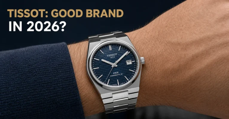 Is Tissot a good brand: a Tissot PRX Powermatic 80 with a deep blue dial on a wrist, integrated bracelet visible
