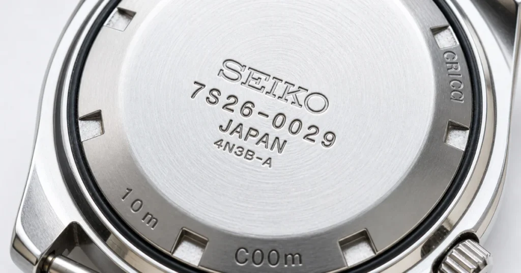 Macro of a Seiko caseback engraved with model number 7S26-0029 and JAPAN