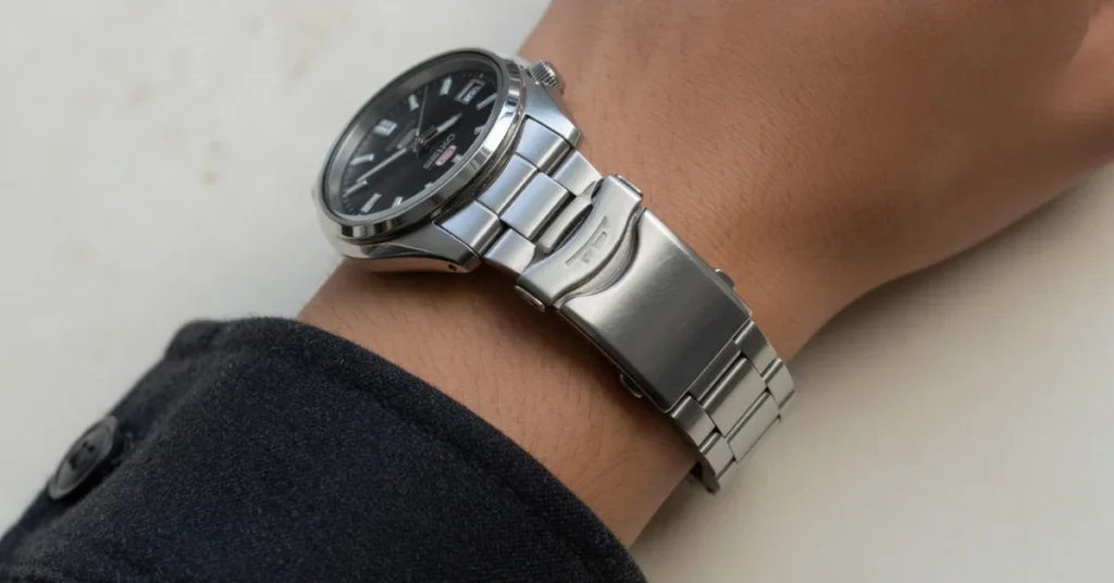 How to shorten Seiko watch band: a properly fitted Seiko bracelet on the wrist with the clasp sitting centered