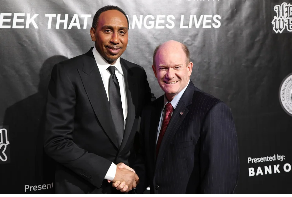 Stephen A. Smith shaking hands at industry event, commentator who rebuilt to $100 million deal