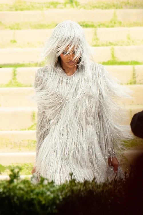 Teyana Taylor in a white fringed gown and shag wig at the Met Gala