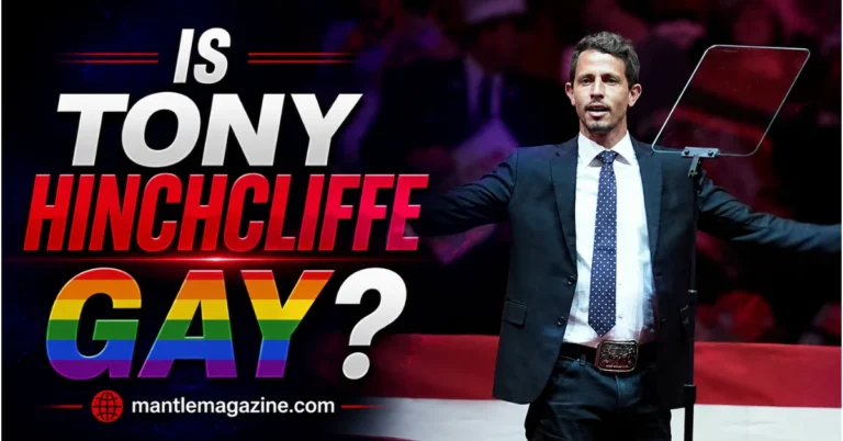 Tony Hinchcliffe on stage in a suit beside the question "Is Tony Hinchcliffe gay?