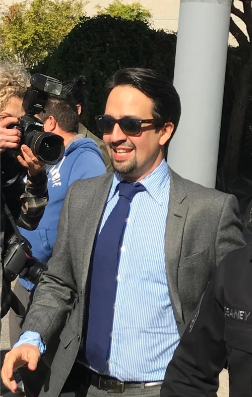 Lin-Manuel Miranda in sunglasses at an outdoor event