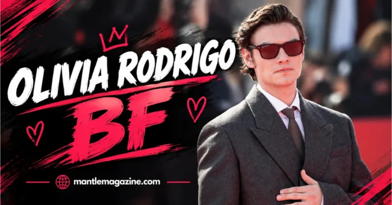 Louis Partridge in a gray suit and sunglasses — featured graphic about Olivia Rodrigo's boyfriend
