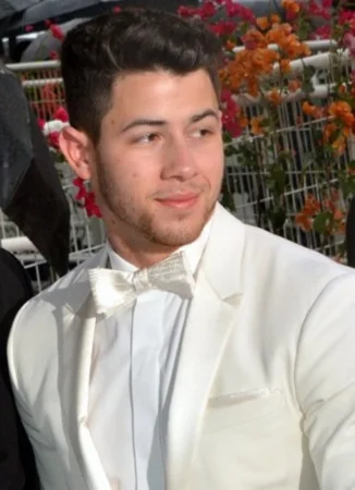 Nick Jonas, Priyanka Chopra's husband, in a white tuxedo