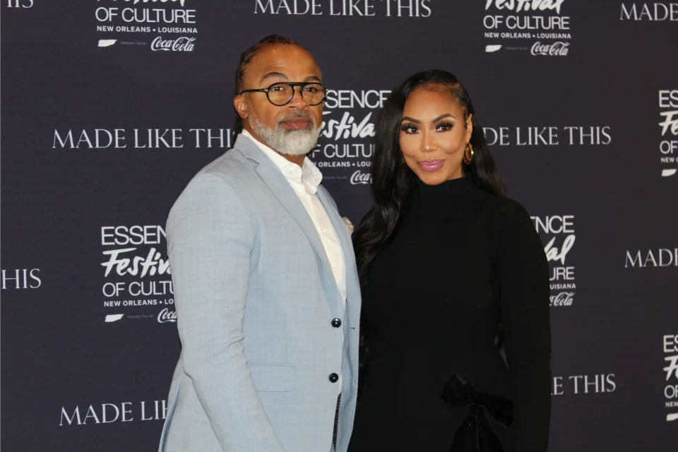 Tamar Braxton with Gilead Sciences executive Rashad Burgess at the 2025 Essence Festival of Culture in New Orleans