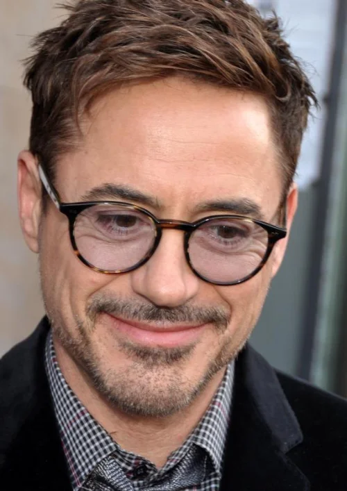 Robert Downey Jr close-up portrait, Iron Man actor with $350-400 million Marvel fortune