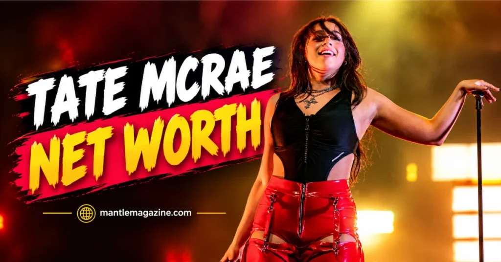 Tate McRae net worth: singer performing live on stage in a black cutout top and red vinyl pants