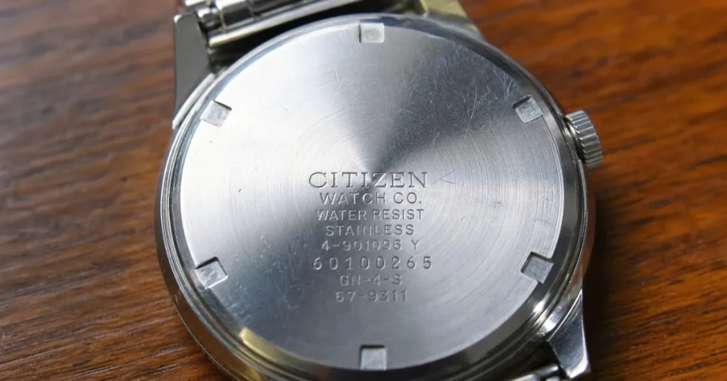 Are Citizen watches good: a close-up of an engraved Citizen case back showing serial and model numbers for authenticity checking